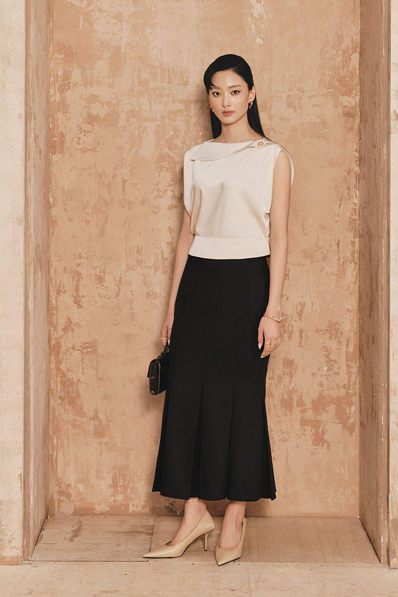 Chân váy đuôi cá xếp ly gấu