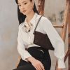 Sơ mi DT lá cổ nhọn thân bấu ly