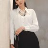 Sơ mi DT lá cổ nhọn thân bấu ly