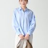 Sơ mi DT phom rộng mở cúc sườn