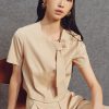 Sơ mi kiểu croptop cổ cài lệch đính nơ