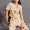 Sơ mi kiểu croptop cổ cài lệch đính nơ