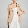 Áo vest suông CT ve cách điệu đính cúc
