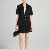 Áo vest suông CT ve cách điệu đính cúc