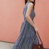 Đầm maxi cổ V vắt nơ, tùng 3 tầng