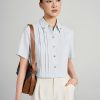 Sơ mi CT croptop lá cổ đức gập góc