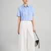 Sơ mi CT croptop lá cổ đức gập góc