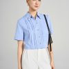Sơ mi CT croptop lá cổ đức gập góc