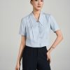 Sơ mi CT đai gấu lá cổ nằm