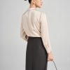 Sơ mi DT lá cổ nhọn thân bấu ly