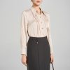 Sơ mi DT lá cổ nhọn thân bấu ly