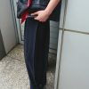 Quần gocho xếp ly sườn, gấu đính cúc
