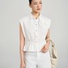 Sơ mi vai chờm chun eo ngực đính hoa