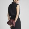 Đầm ôm vai chờm tùng váy luồn đai