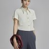 Sơ mi CT croptop nẹp bong đính cúc