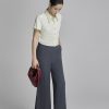 Sơ mi CT croptop nẹp bong đính cúc