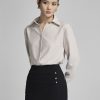 Chân váy suông bong bụng xếp ly