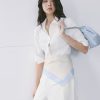 Sơ mi DT xẻ sau nẹp mở V