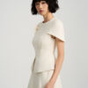Đầm party peplum can tùng, ngực cài hoa