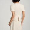Đầm party peplum can tùng, ngực cài hoa