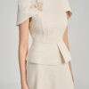 Đầm party peplum can tùng, ngực cài hoa