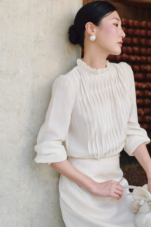 Sơ mi DT bèo cổ xếp ly lật dọc thân