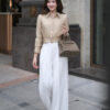 Sơ mi DT croptop đai gấu nhún thân
